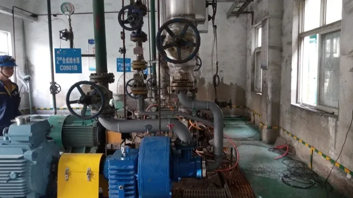 Close view of an EHIK pump, motor, coupling guard, instruments and connected piping at Jingbao Xinao.
