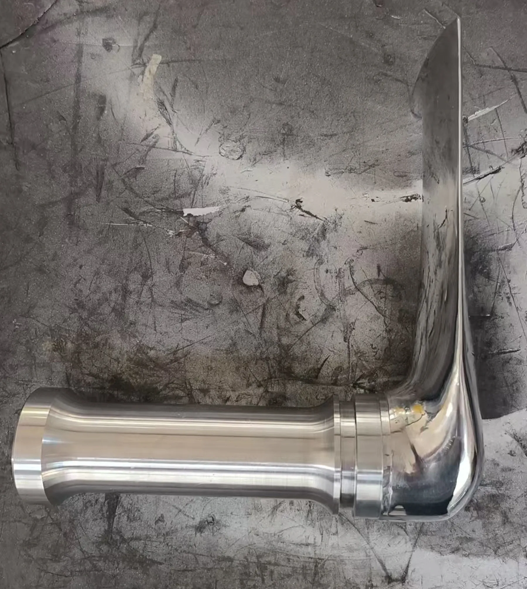 Side view of an EHIK S-484 pickup tube showing its curved inlet and mounting end.