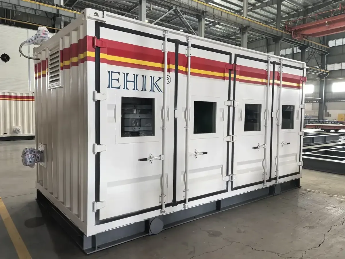 EHIK enclosed skid in the workshop, with exterior doors, base and connections.